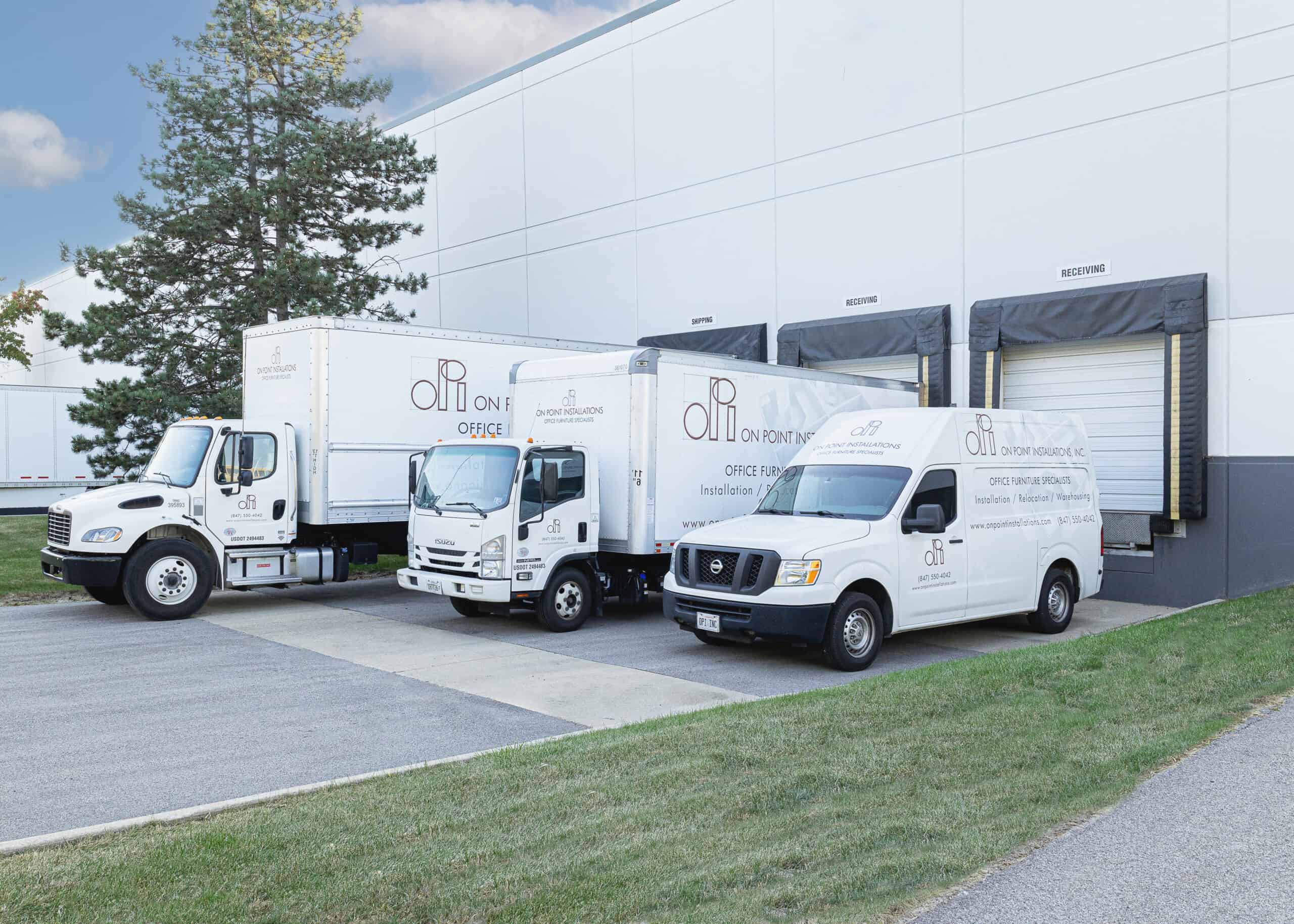 On Point Installations trucks at warehouse docks in Wauconda, IL